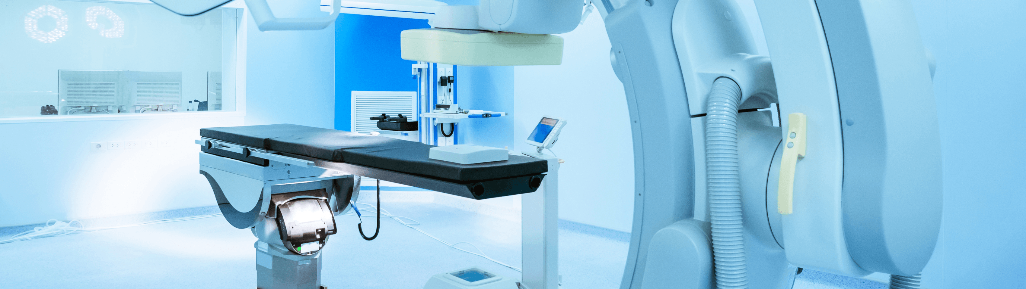 Close-up of precision scanning/industrial equipment, blue-toned